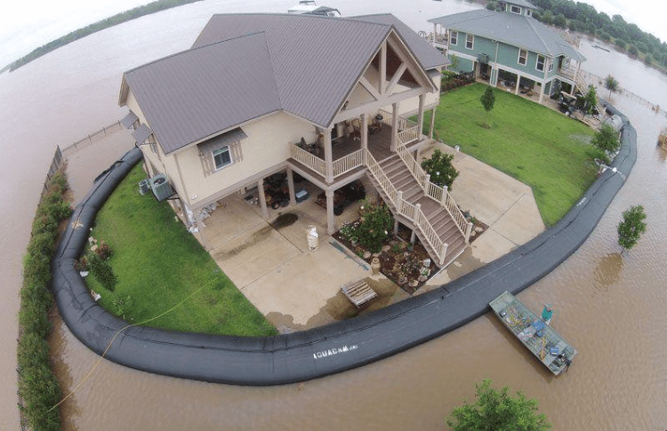 Portable inflatable dams can protect a property from flood inundation.
